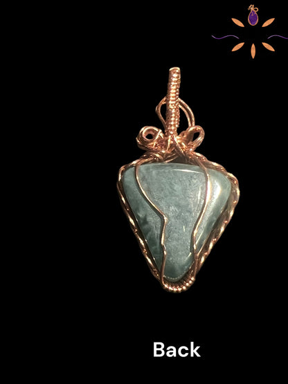 Guatemalan Blue Jade Gemstone Pendant wrapped in Copper