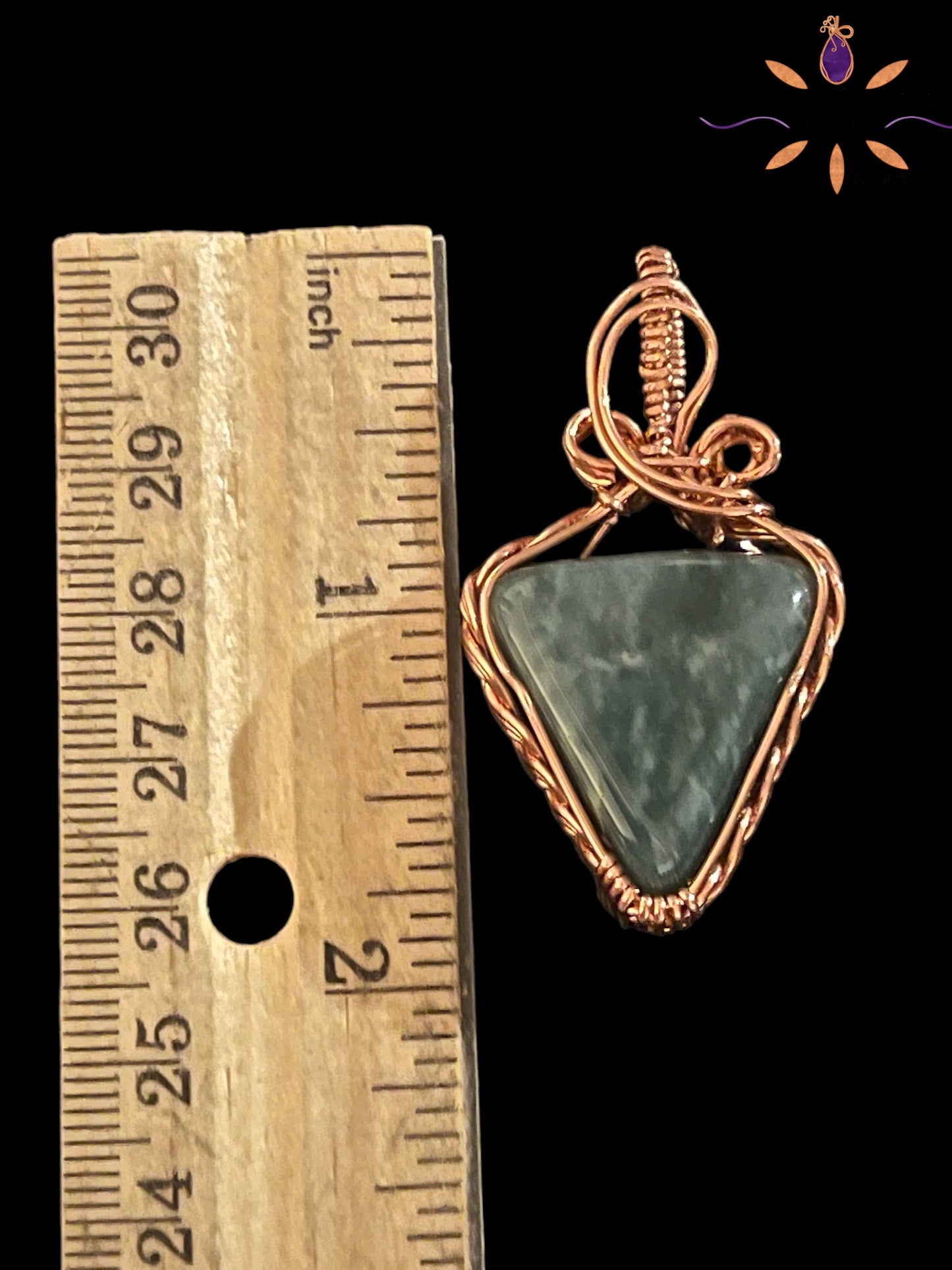 Guatemalan Blue Jade Gemstone Pendant wrapped in Copper